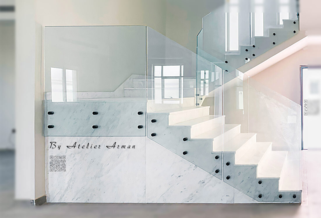 A bespoke architectural glass staircase with a luxe design, custom-made in Dubai and installed in the Siyooh area of Sharjah.